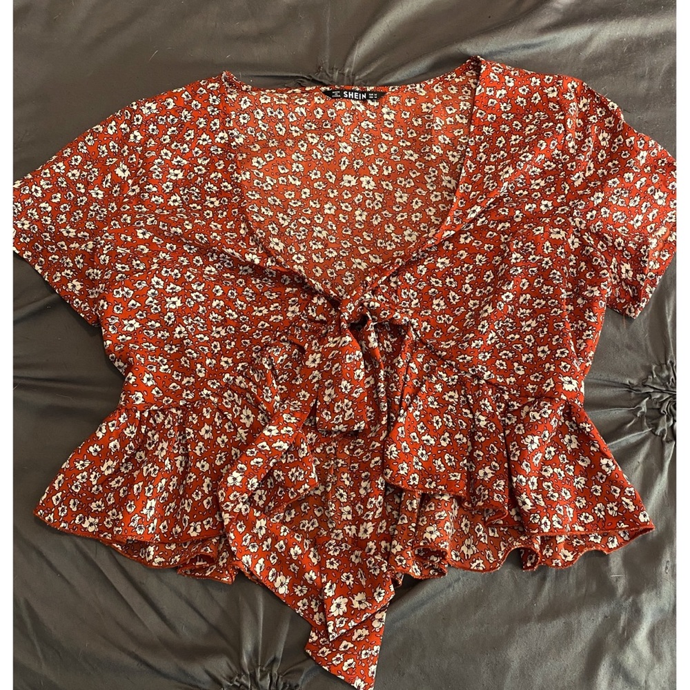 Floral V neck blouse. Semi cropped. Never worn.